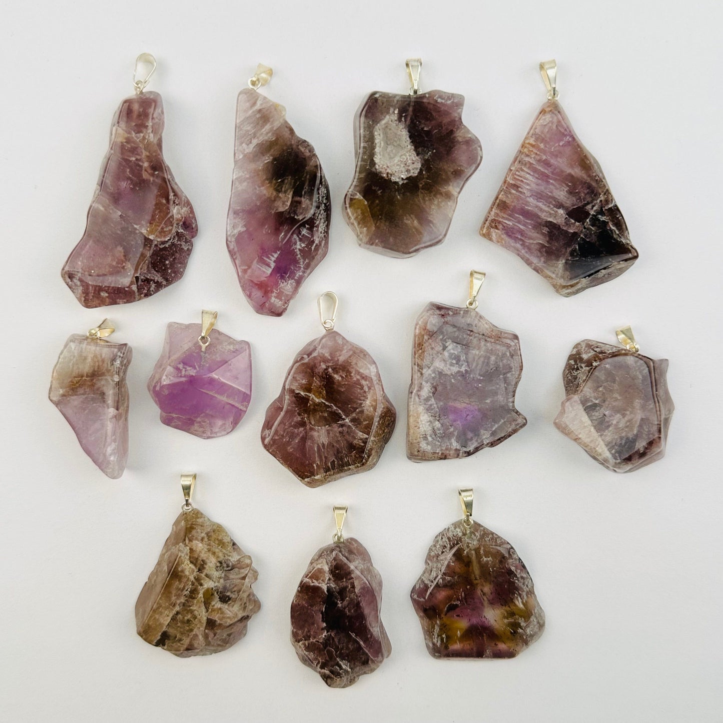 multiple pendants displayed to show the differences in the color shades and sizes 