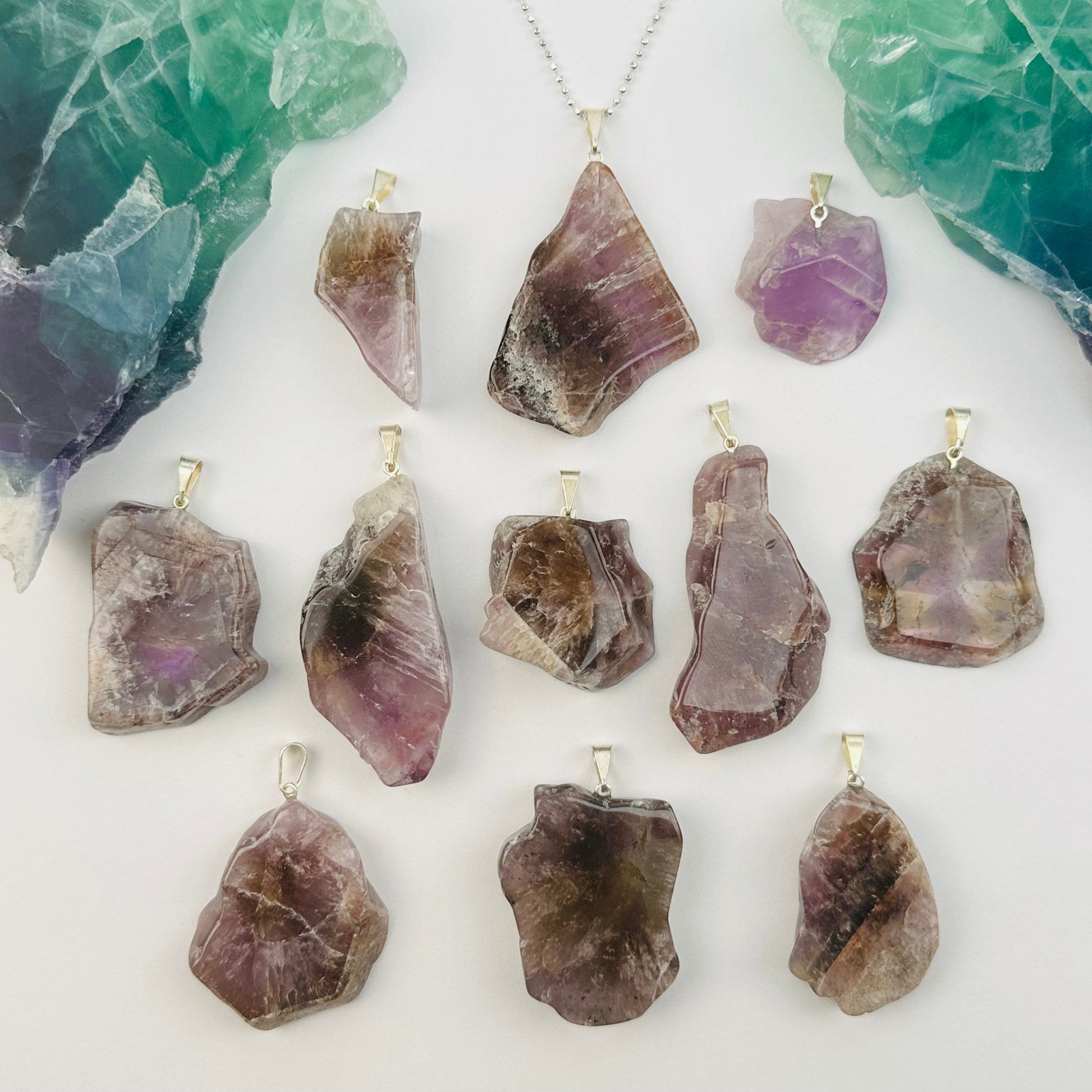 multiple pendants displayed to show the differences in the sizes and color shades 