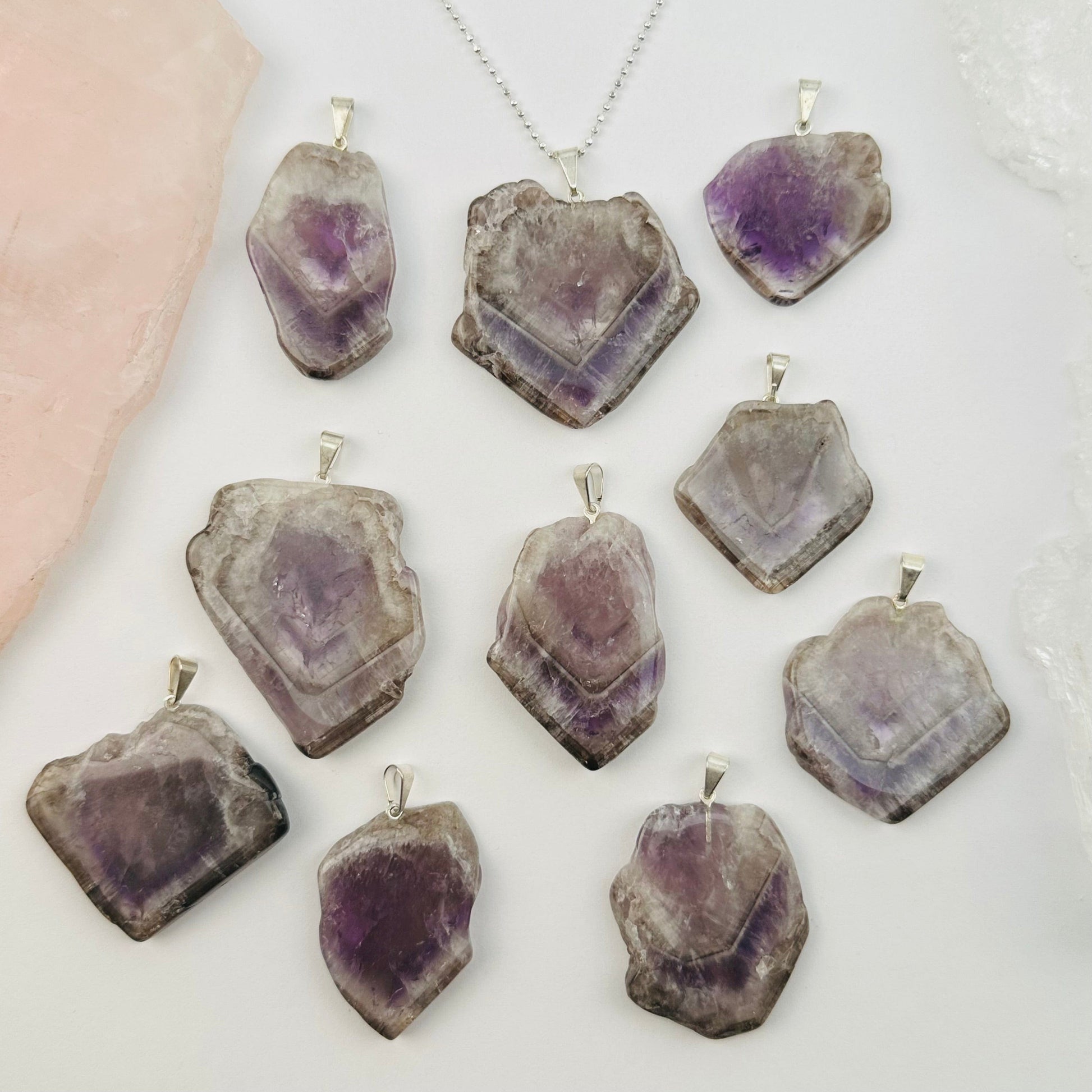 multiple pendants displayed to show the differences in the color shades and sizes 