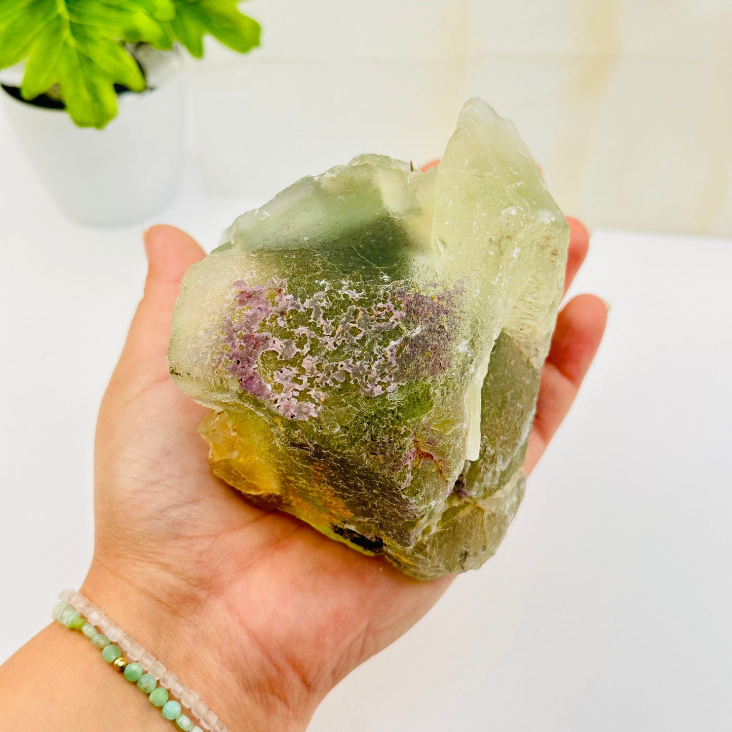 high quality fluorite cluster on hand for size reference 