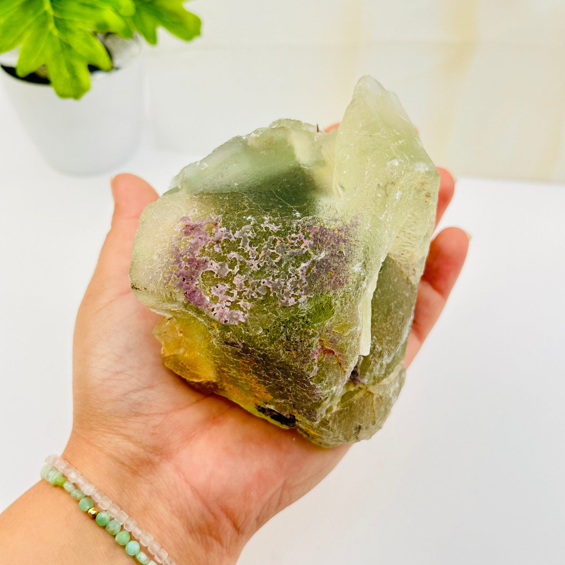 high quality fluorite cluster on hand for size reference 