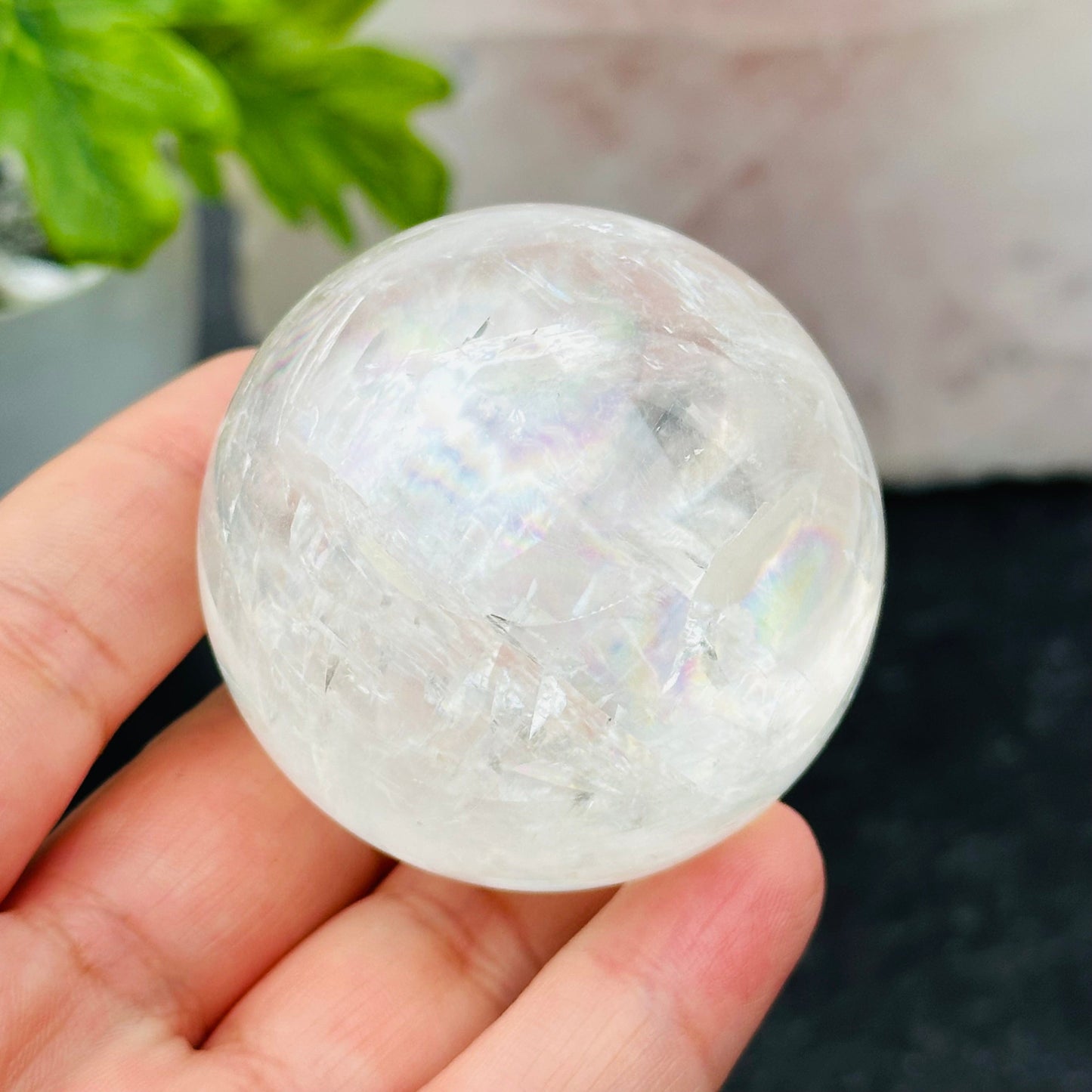 close up of some rainbow flashed on this calcite sphere 