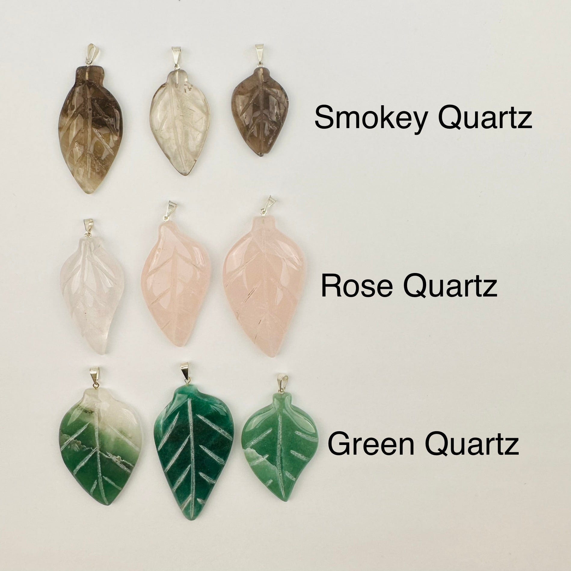 Crystal Gemstone Leaf Polished Pendant - Silver Bail next to its crystal name 
