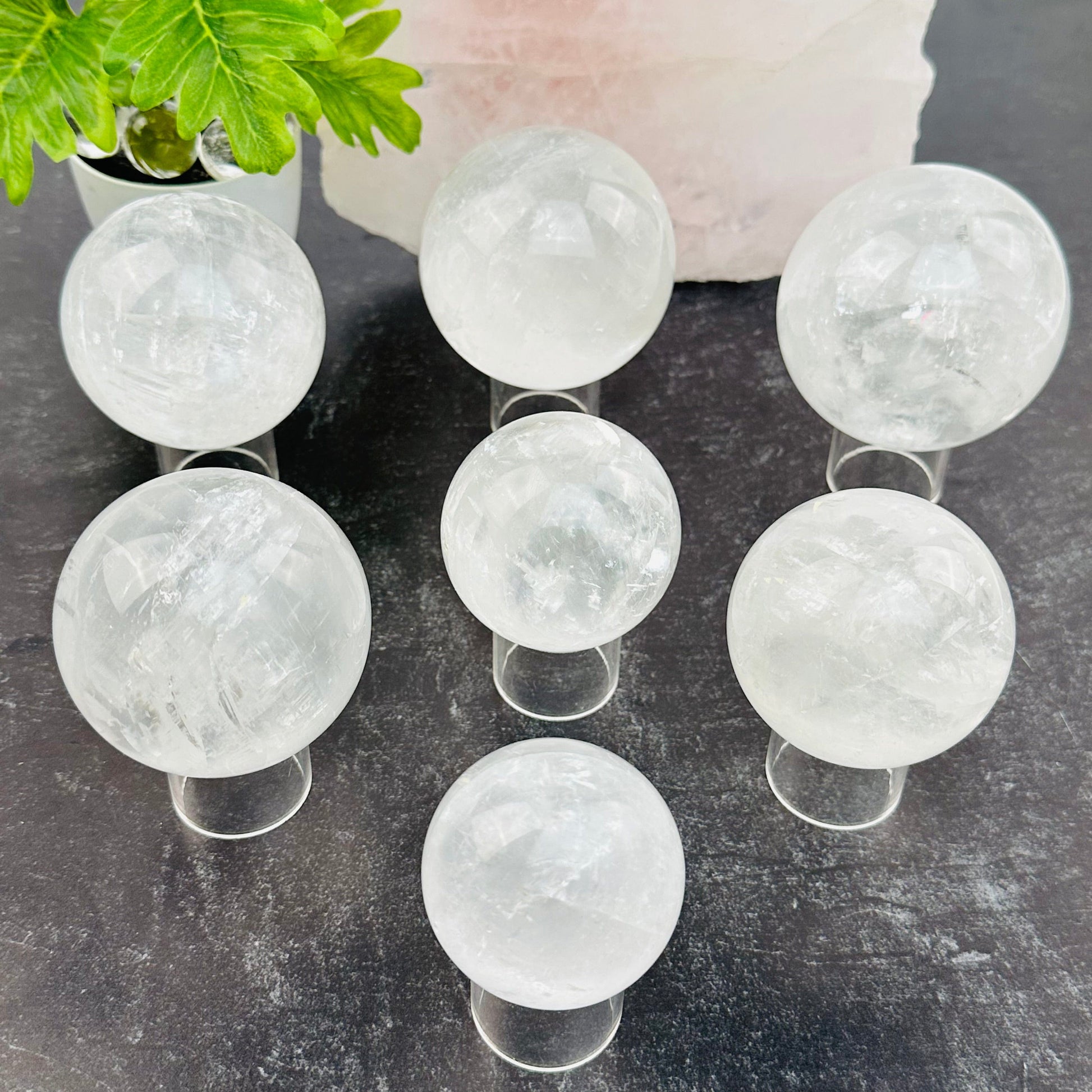 multiple calcite spheres displayed to show the differences in the sizes 