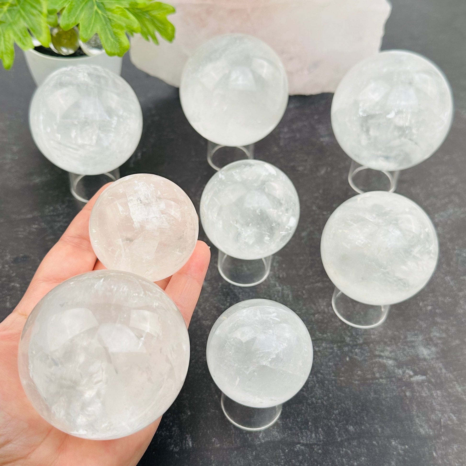 multiple calcite spheres displayed to show the differences in the sizes 