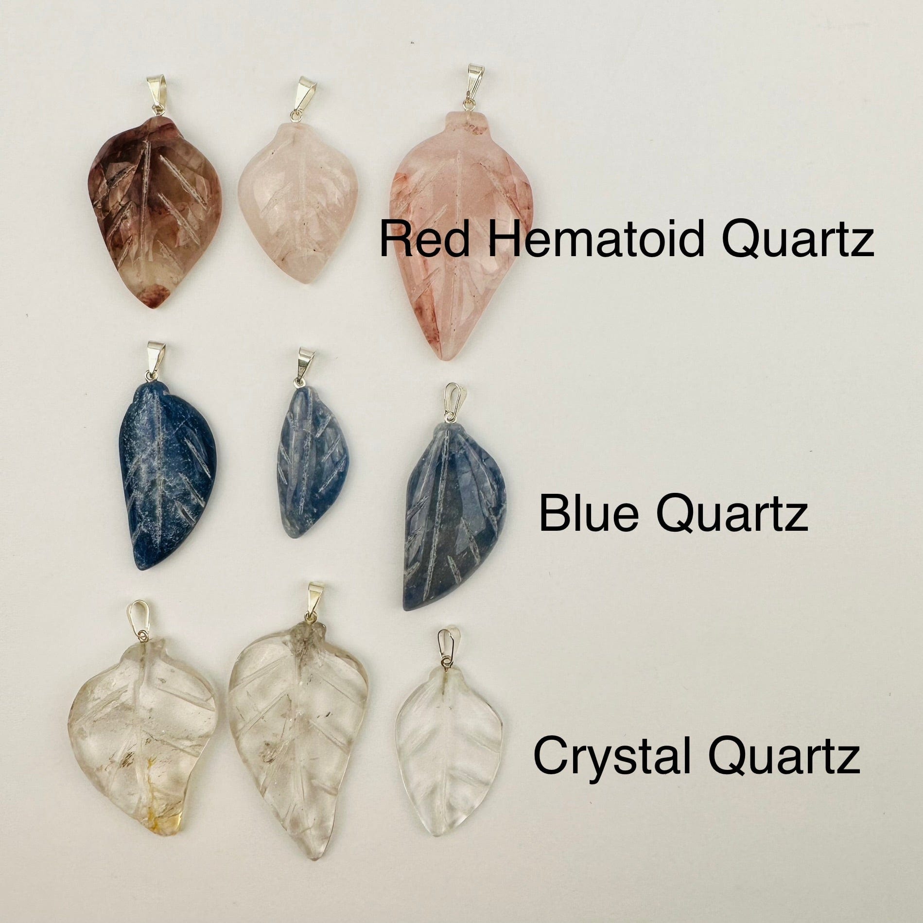 Crystal Gemstone Leaf Polished Pendant - Silver Bail next to its crystal name 