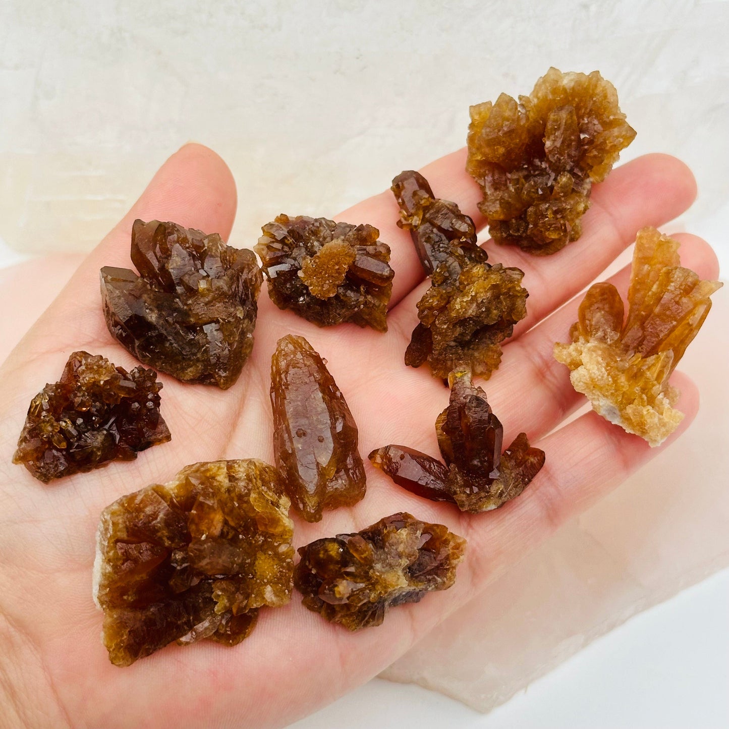 citrine clusters come in small sizes. crystals in hand for size reference 