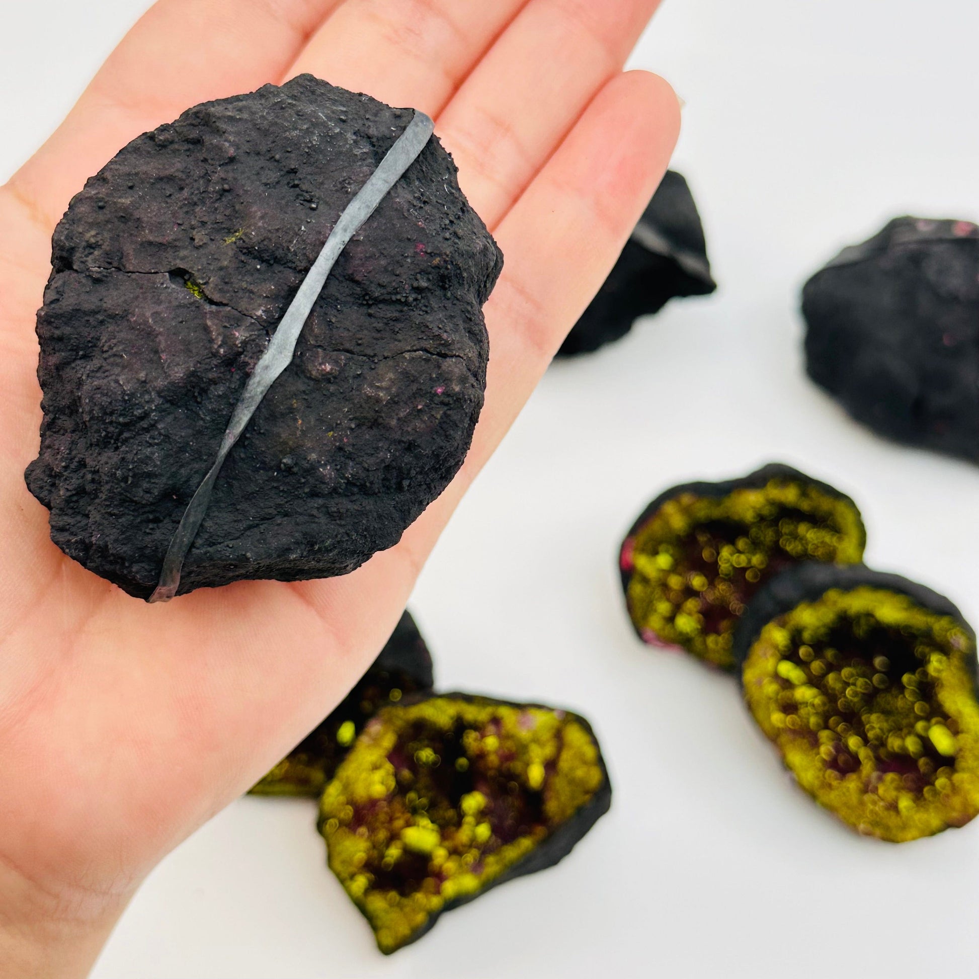 unopened geode on hand for size reference 