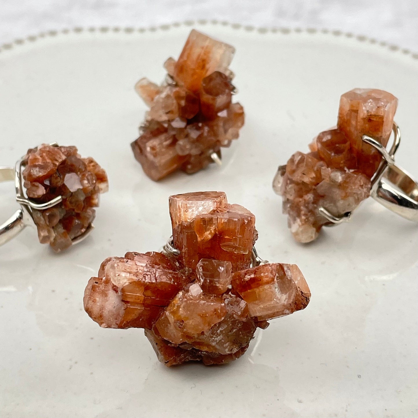 close up of the details on the cluster rings