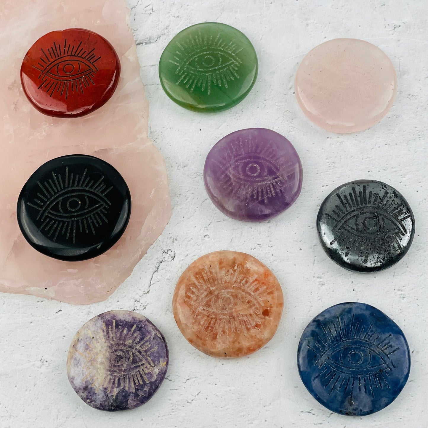 multiple engraved stones displayed to show the differences in the stone types 