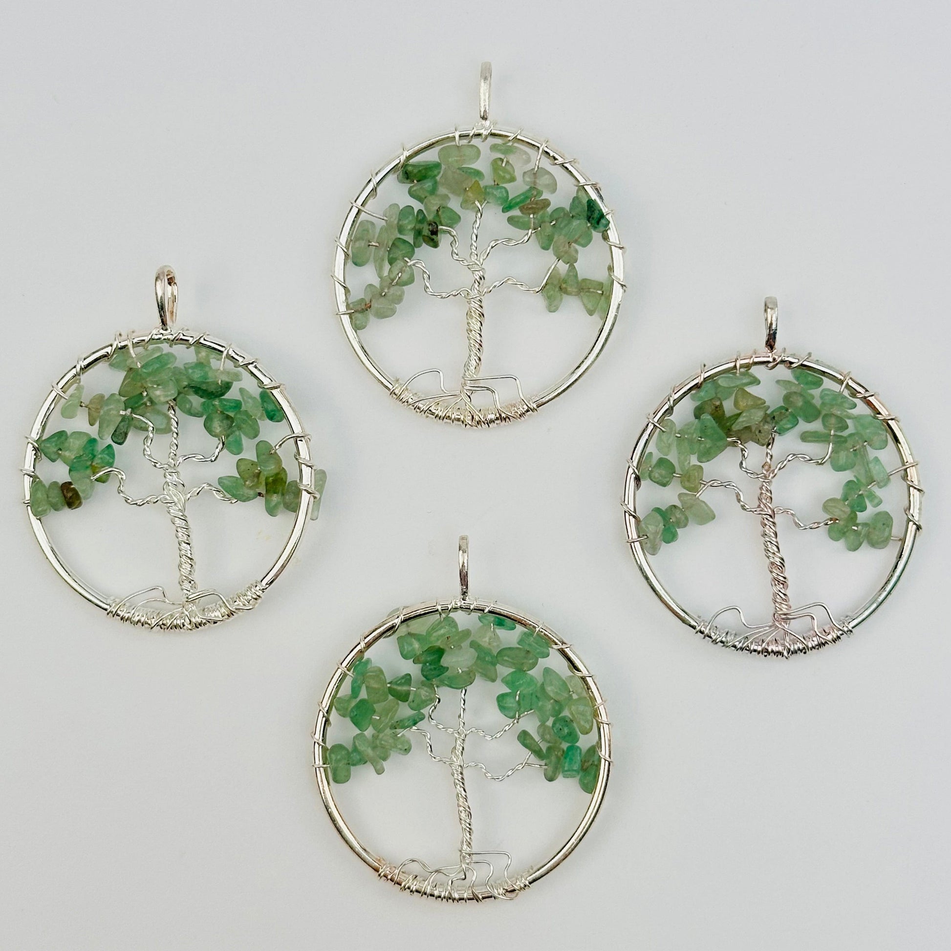 wire wrapped tree of life crystal pendants