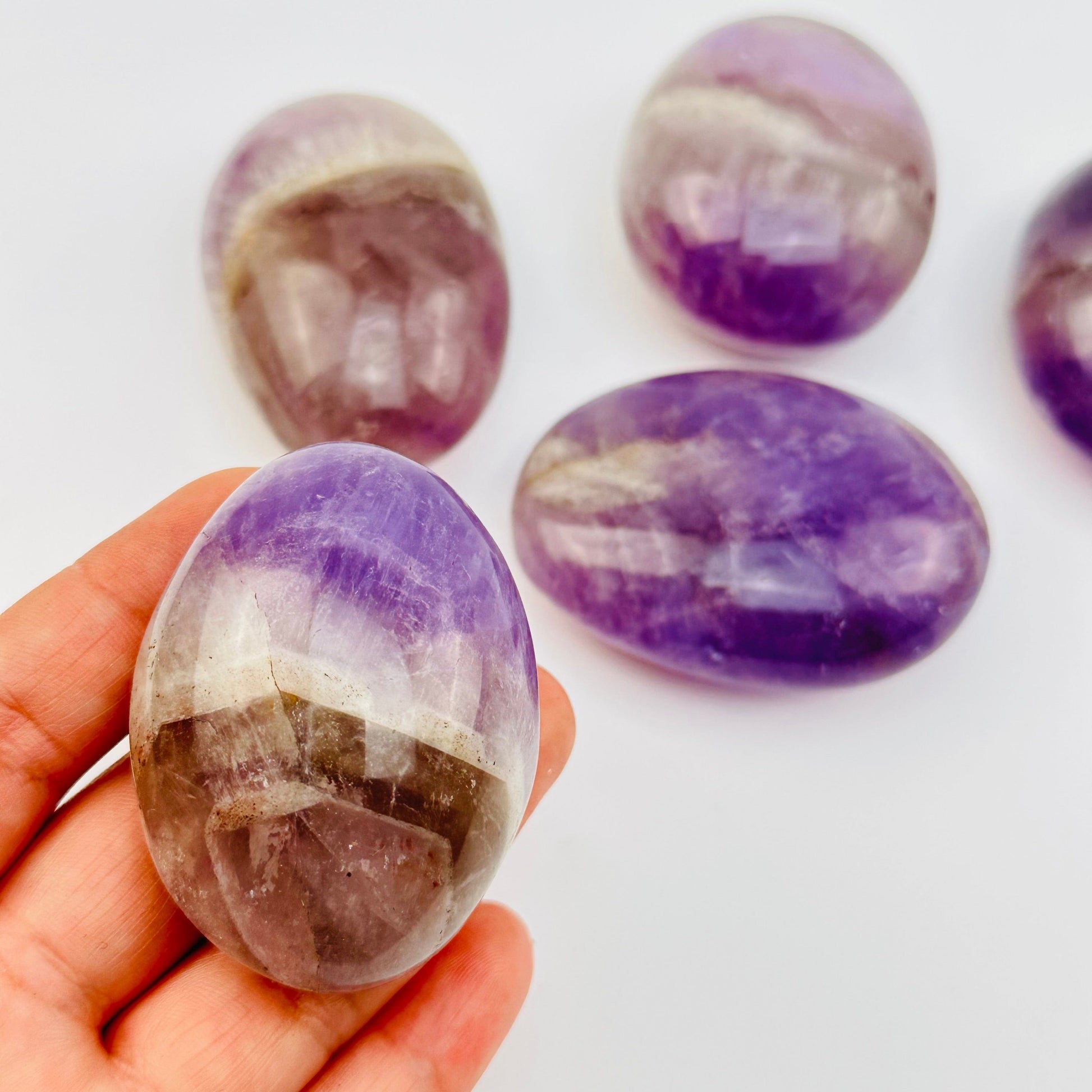 close up of the details on this crystal palm stone 