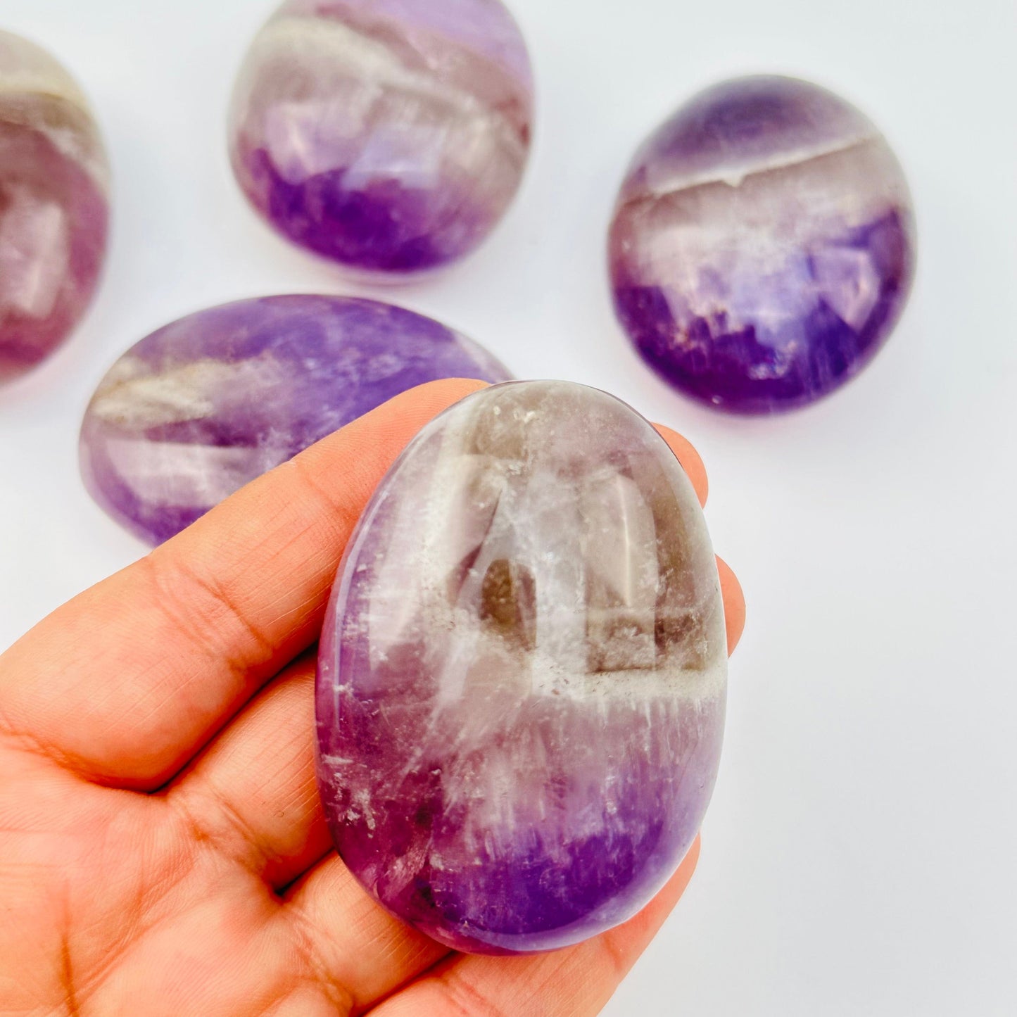 close up of the details on this crystal palm stone 