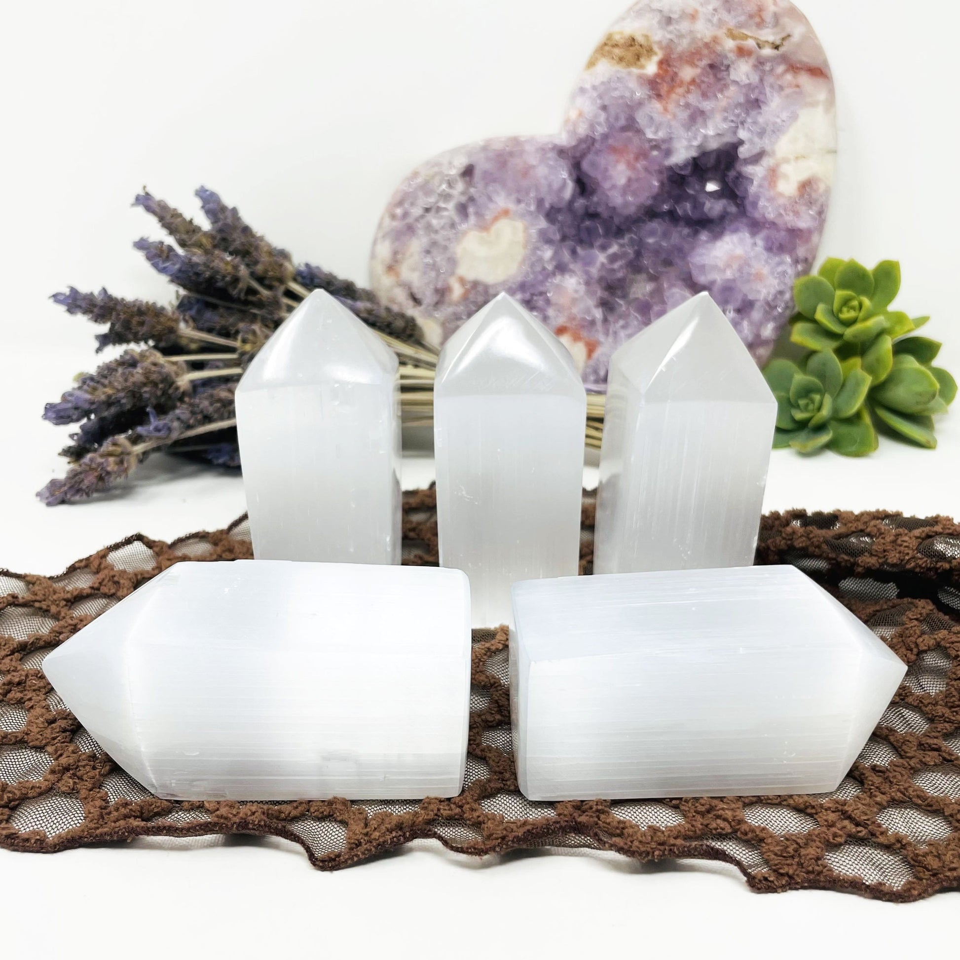 many selenite square points on display for possible variations