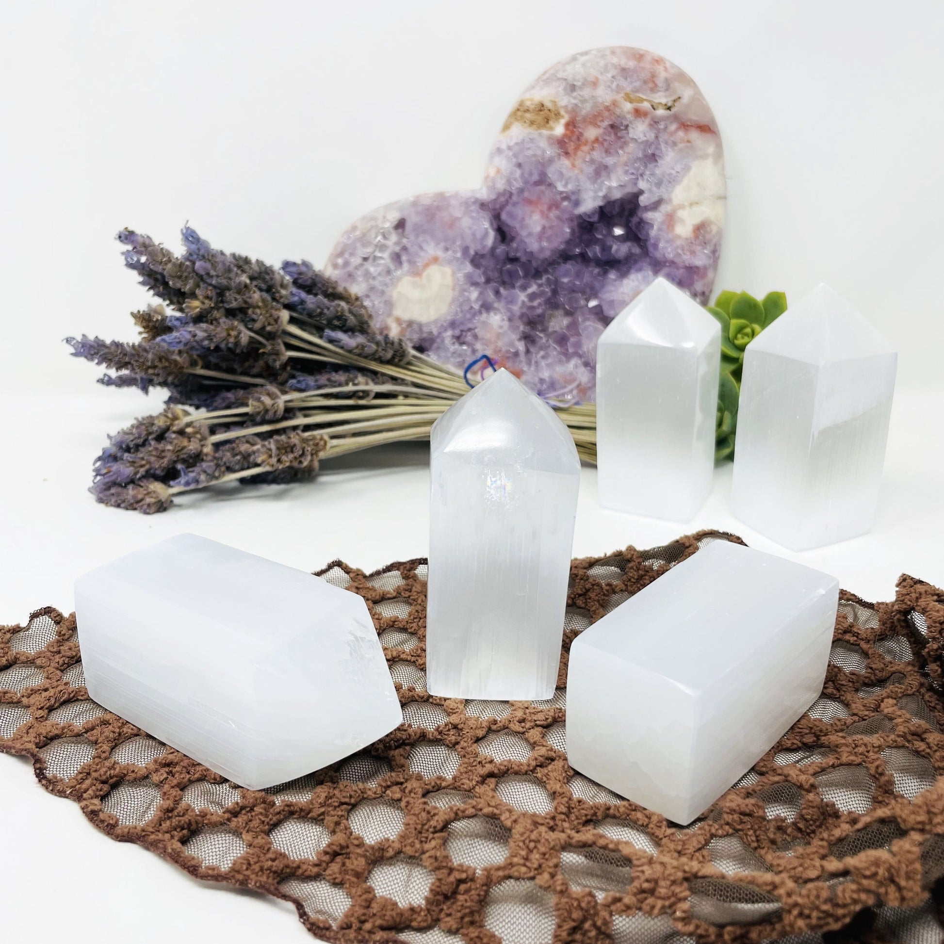 many selenite square points on display