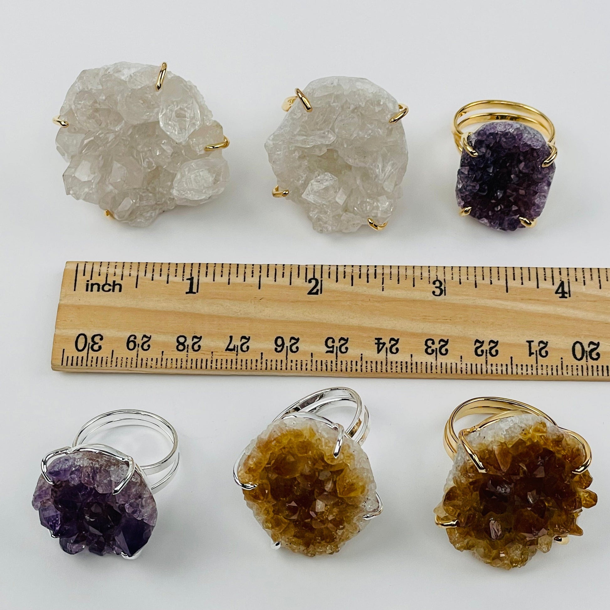 rings next to a ruler for size reference 