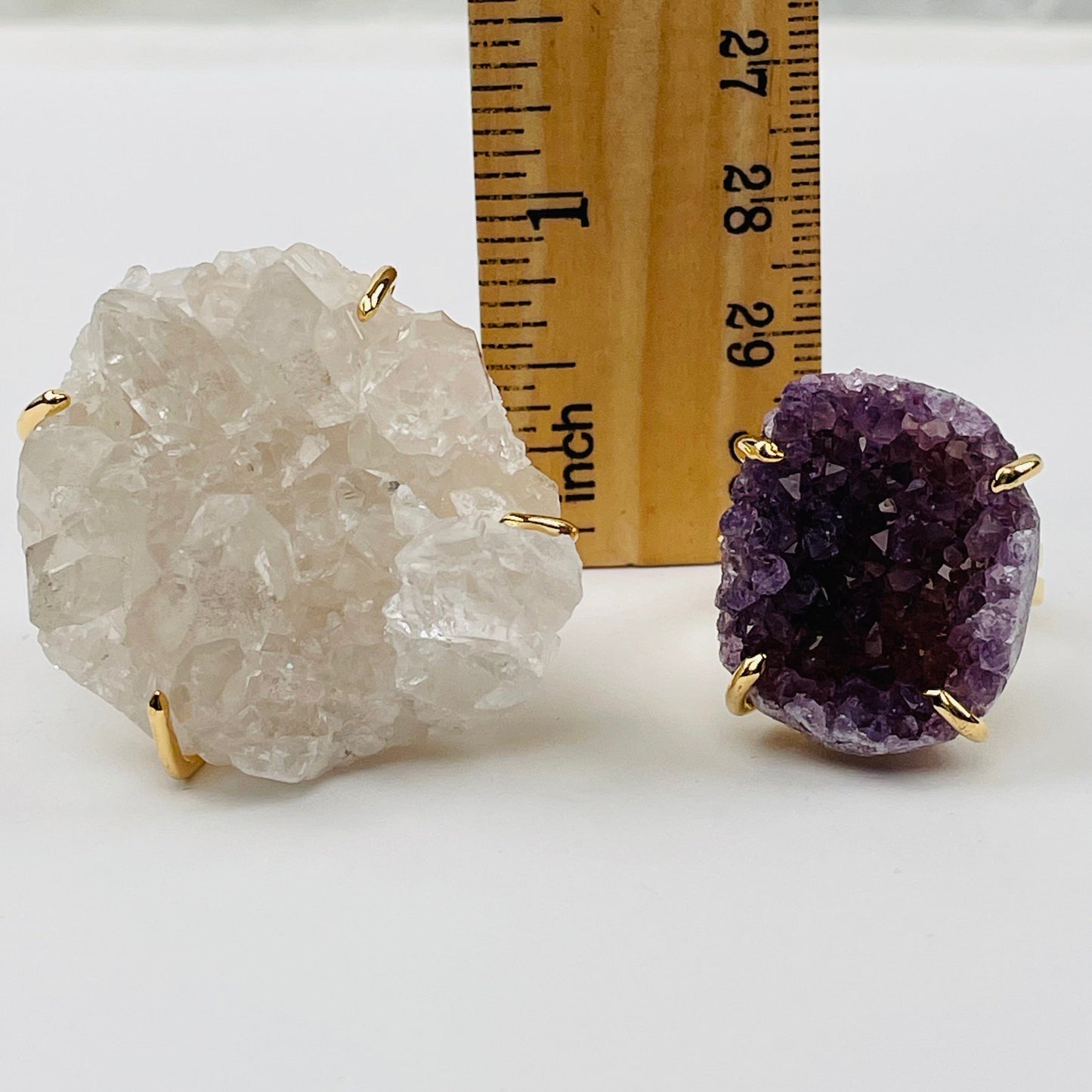 rings next to a ruler for size reference 