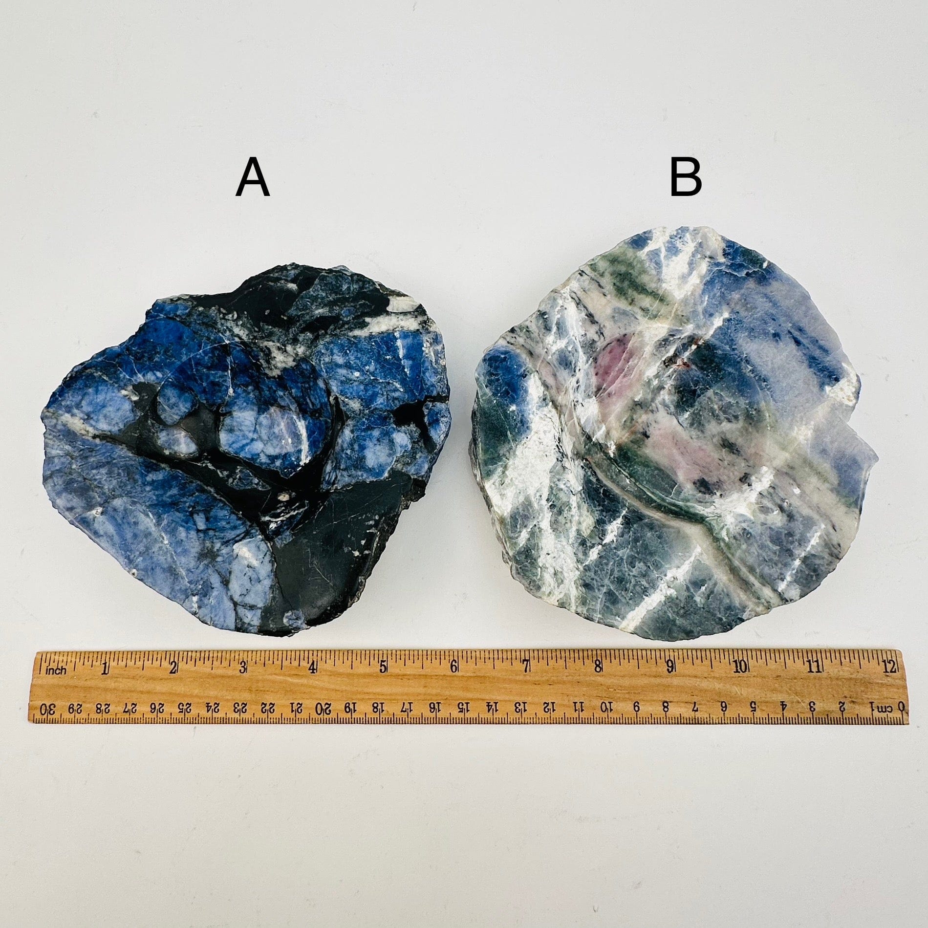sodalite crystal dish next to a ruler for size reference 