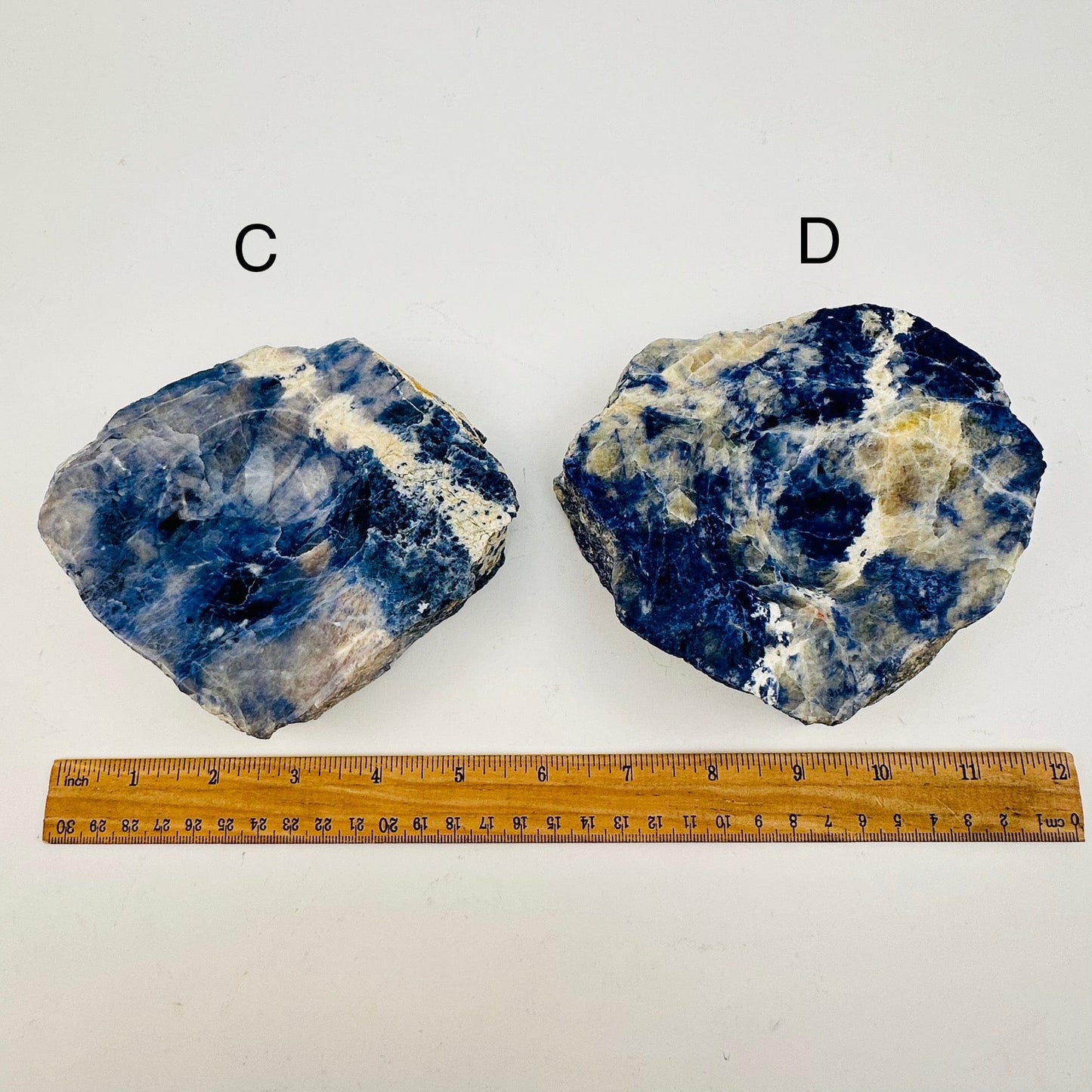 sodalite crystal dish next to a ruler for size reference 