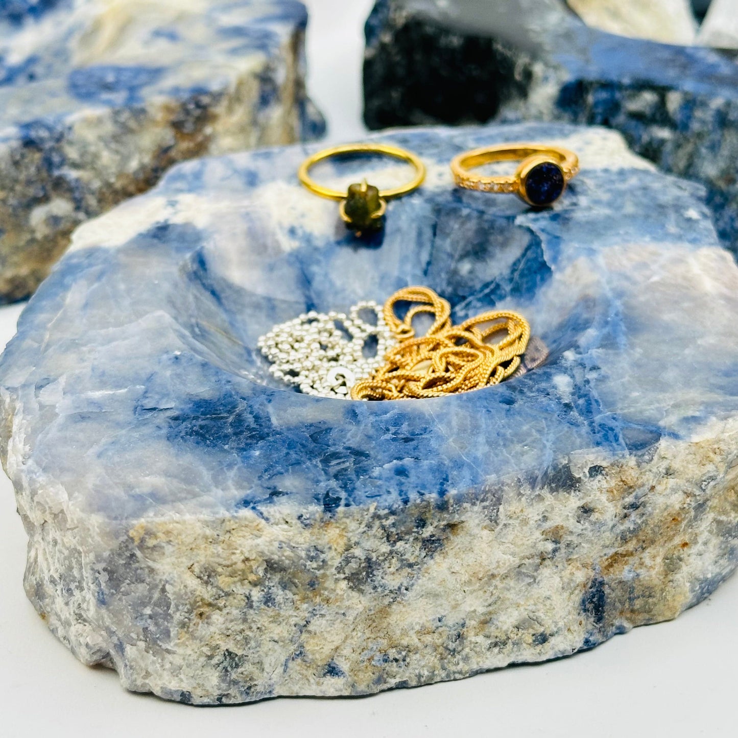 sodalite dish displayed as home decor. can be used to hold jewelry, keys or crystals 