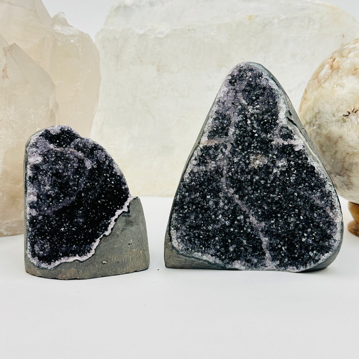 black amethyst druzy cut base crystals displayed as home decor 