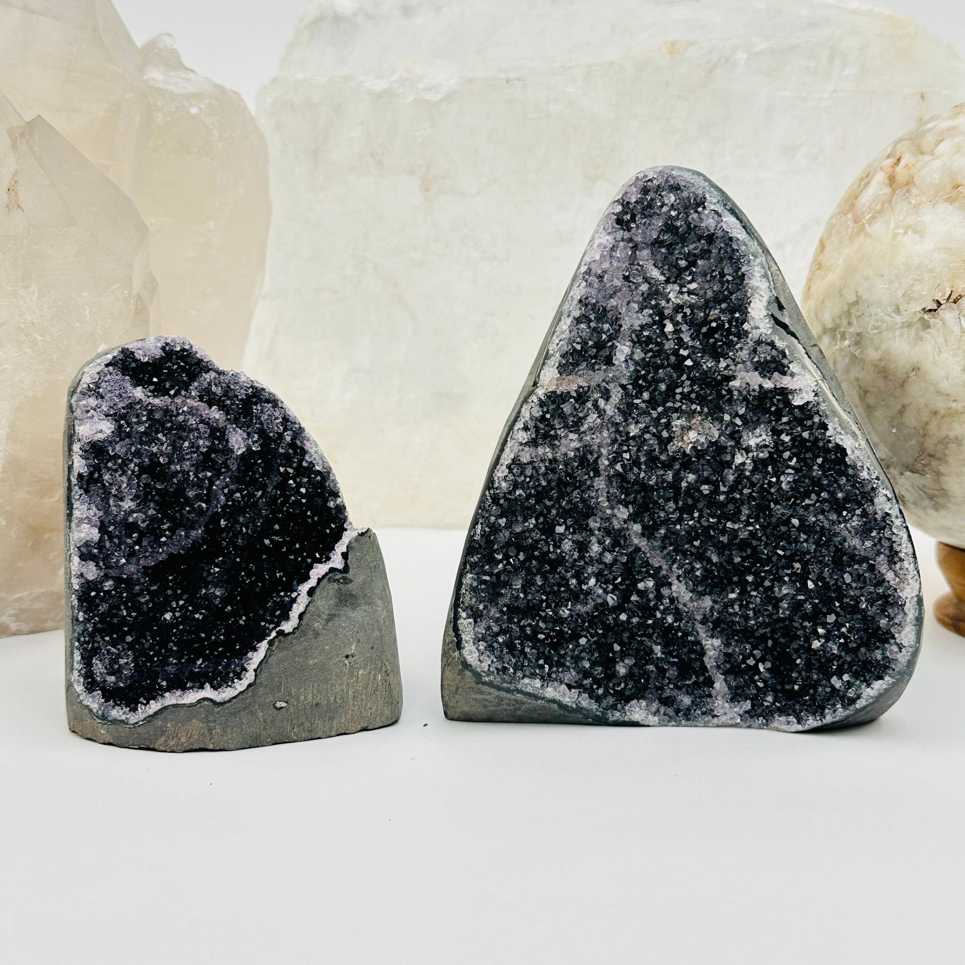 black amethyst druzy cut base crystals displayed as home decor 