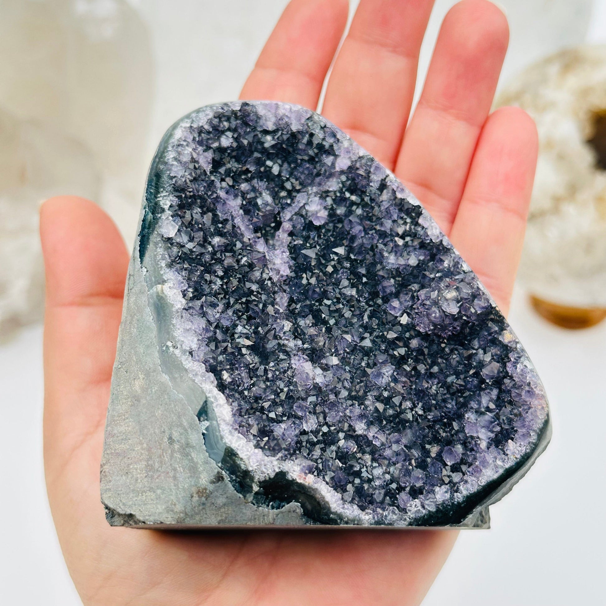 close up of the details on this black amethyst druzy cut base 