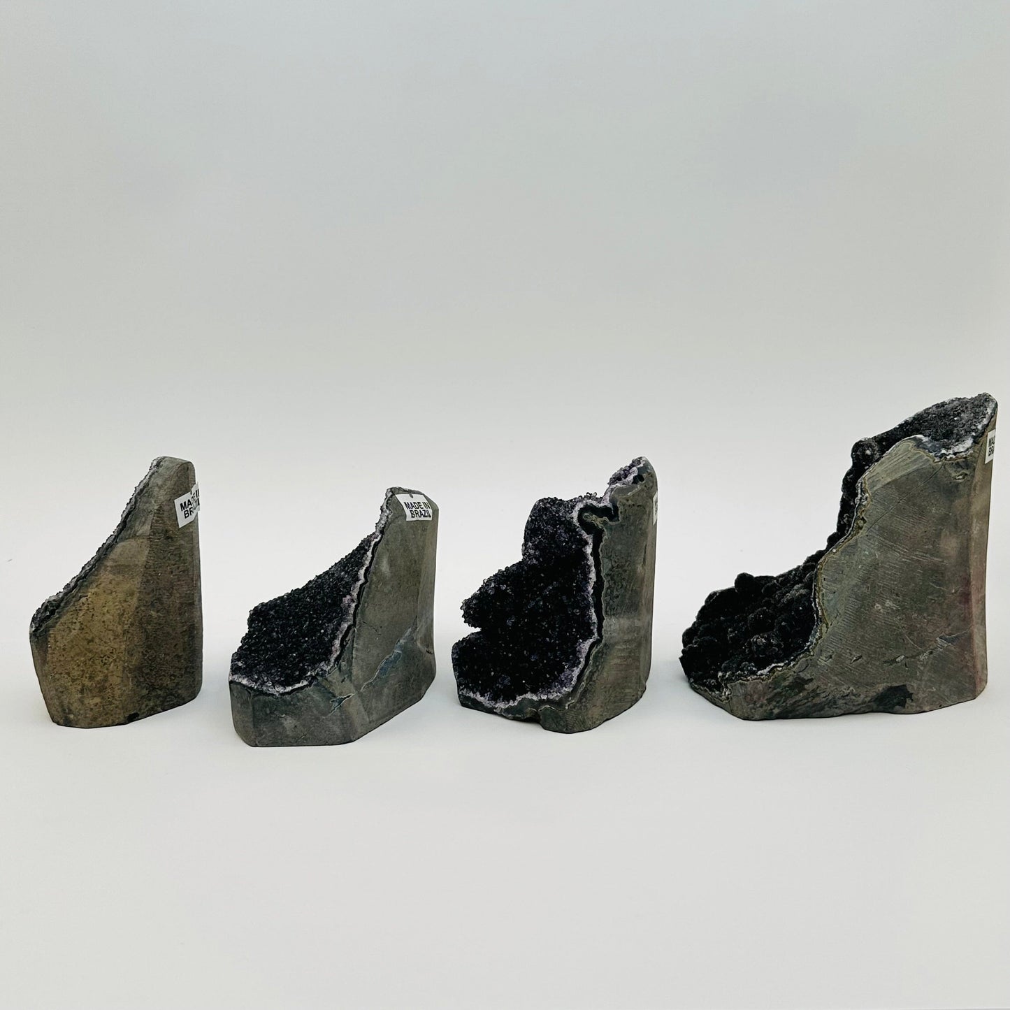 side view to show the thickness view of the black amethyst crystal cut base