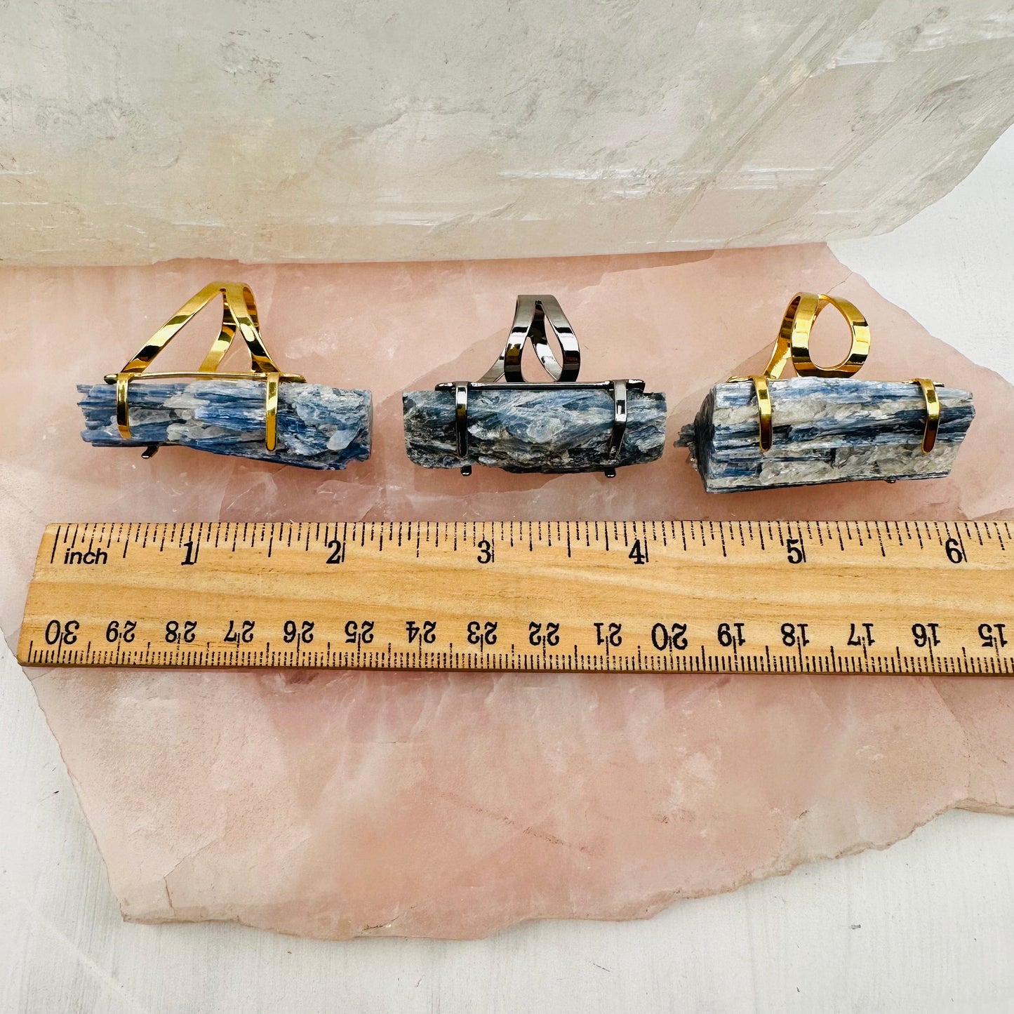 rings next to a ruler for size reference 