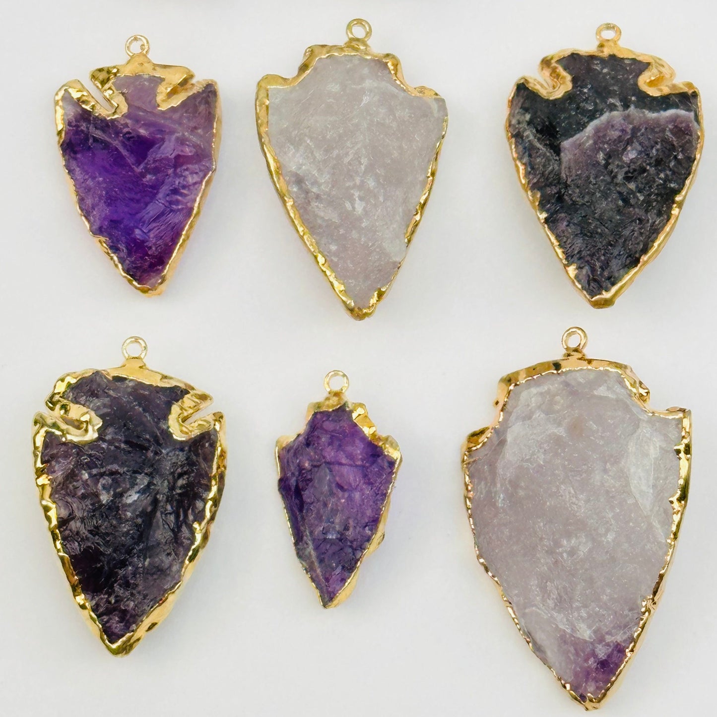 close up of the details on these amethyst pendant charms 