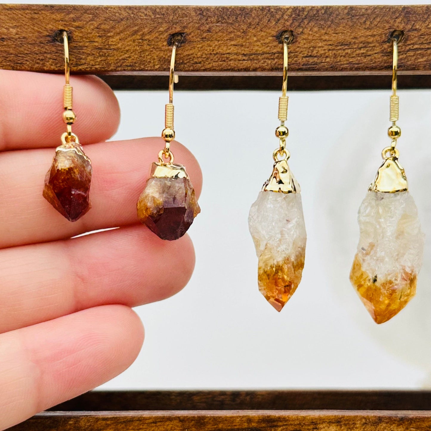 earring pair in hand for size reference 