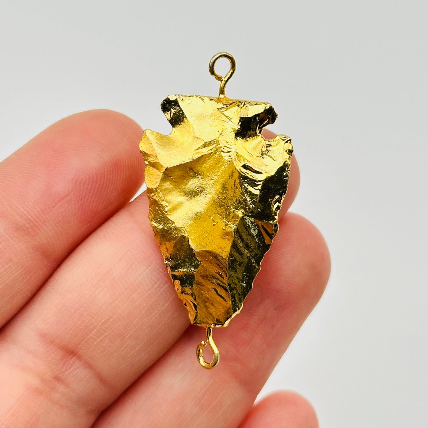 close up of the details on this double bail pendant charm 