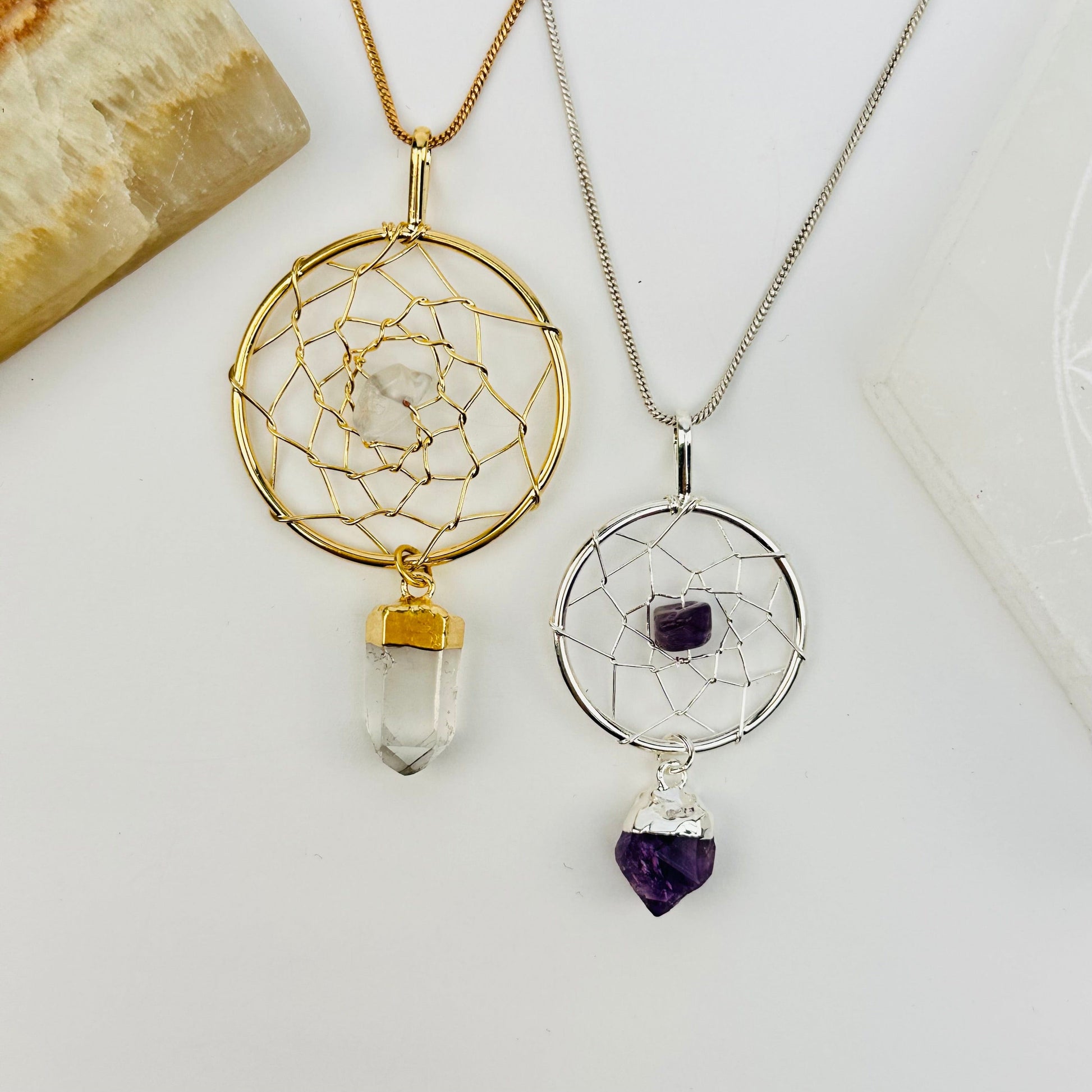 crystal pendants on a necklace chain to show how they hang 