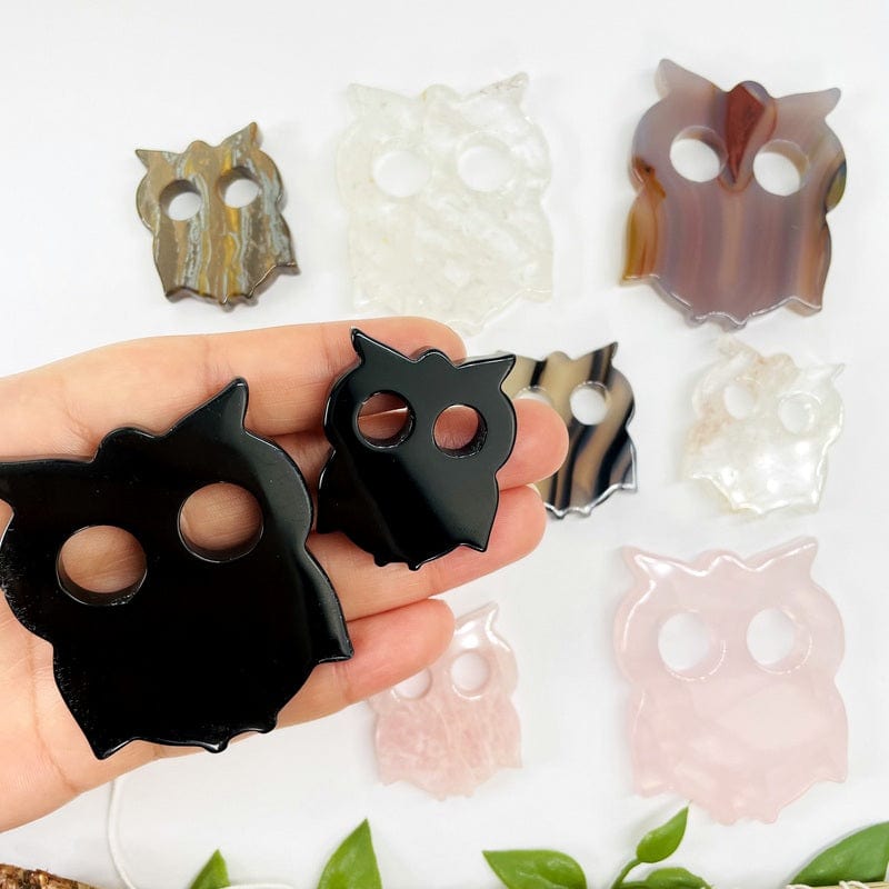 small and large gemstone owl in hand for size reference 