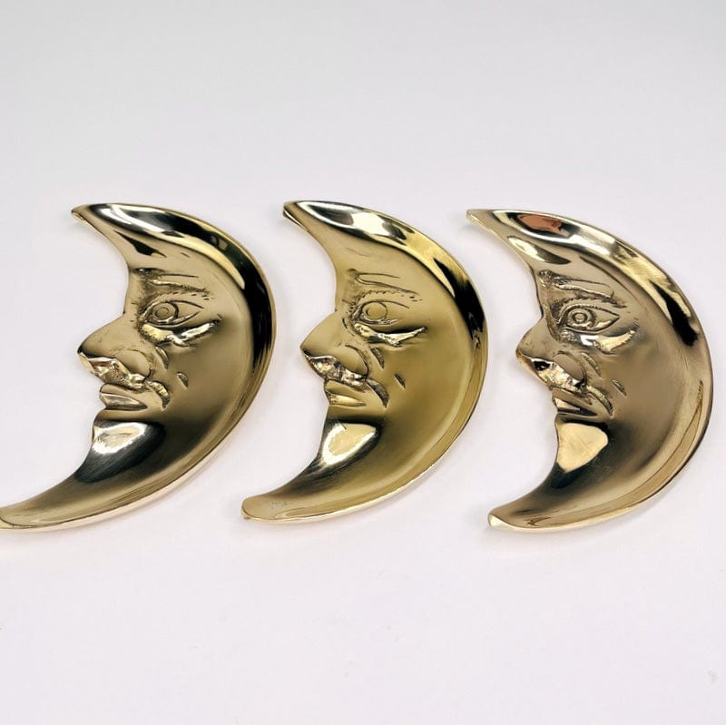 multiple moon trays displayed to show the slight differences between them 
