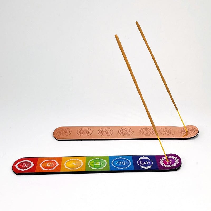 burners displayed with incense sticks 