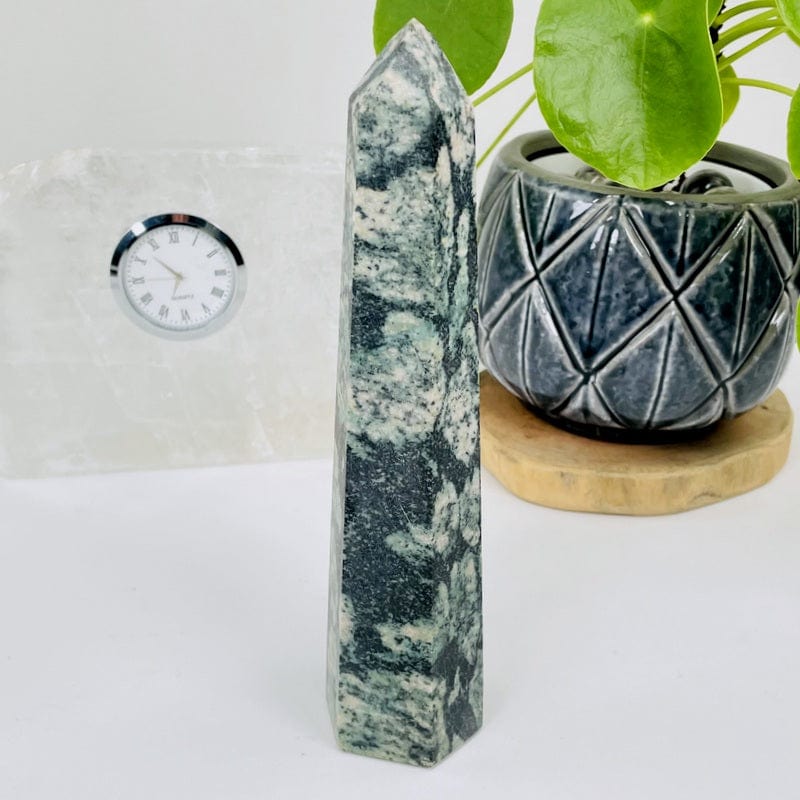 green snakeskin jasper point set as home decor 