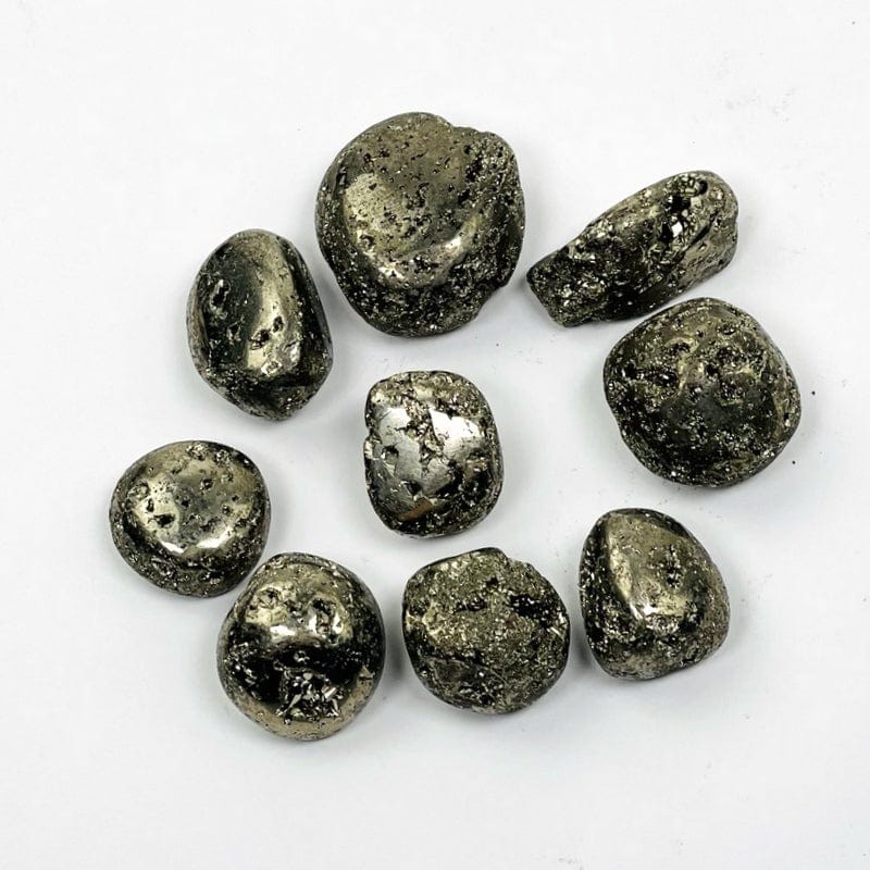 tumbled pyrite on white background