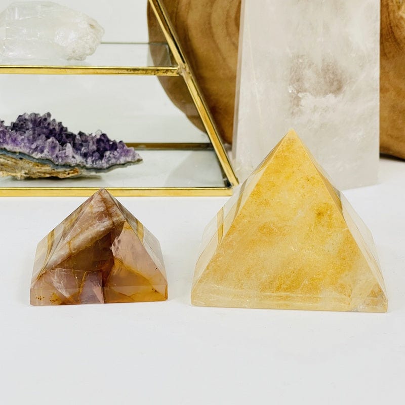 golden healer pyramids displayed to show the differences in the sizes available 