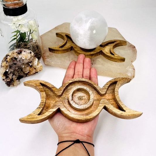 moon phase mango wood sphere holder in hand for size reference 