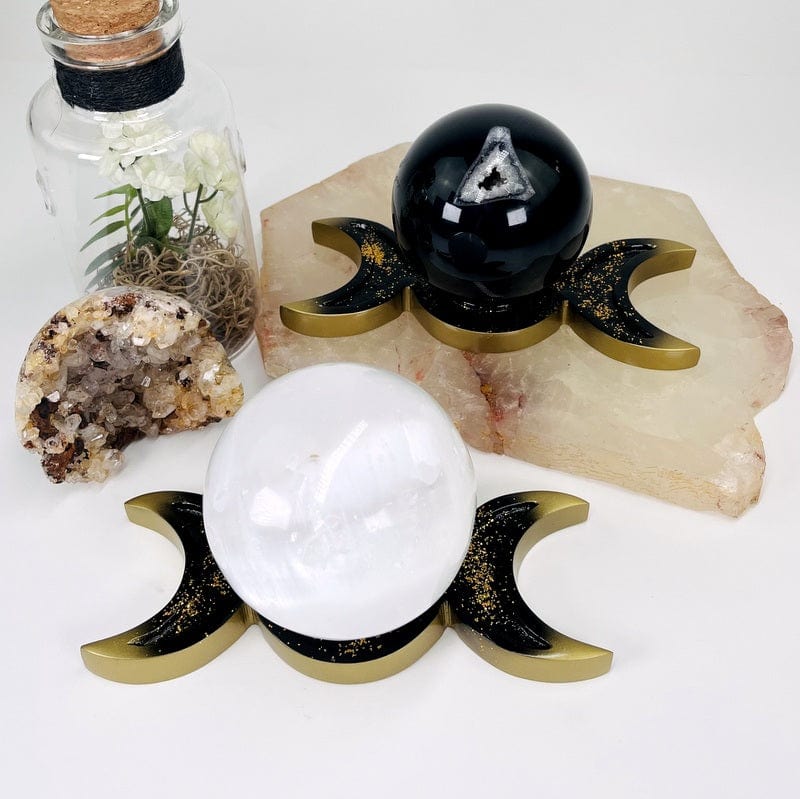 sphere holders displayed with a sphere as home decor 