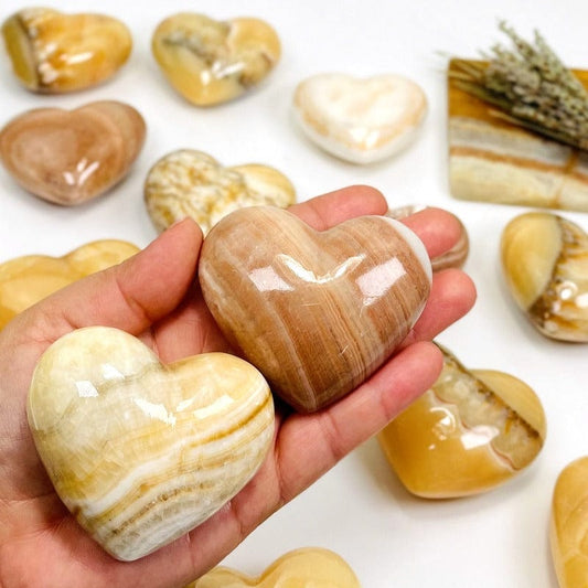 mexican onyx hearts on hand for size reference 