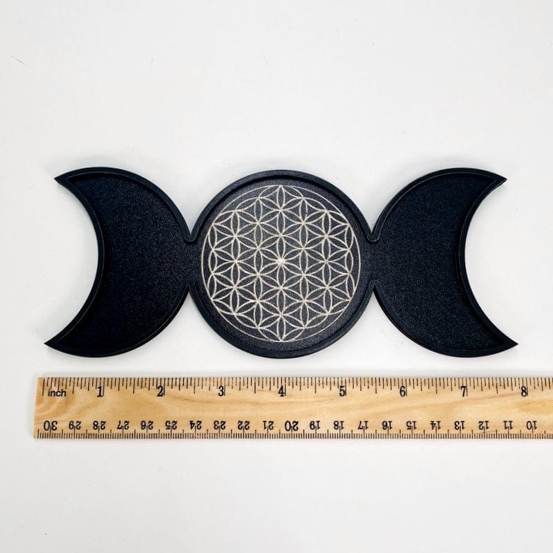wooden tray next to a ruler for size reference 