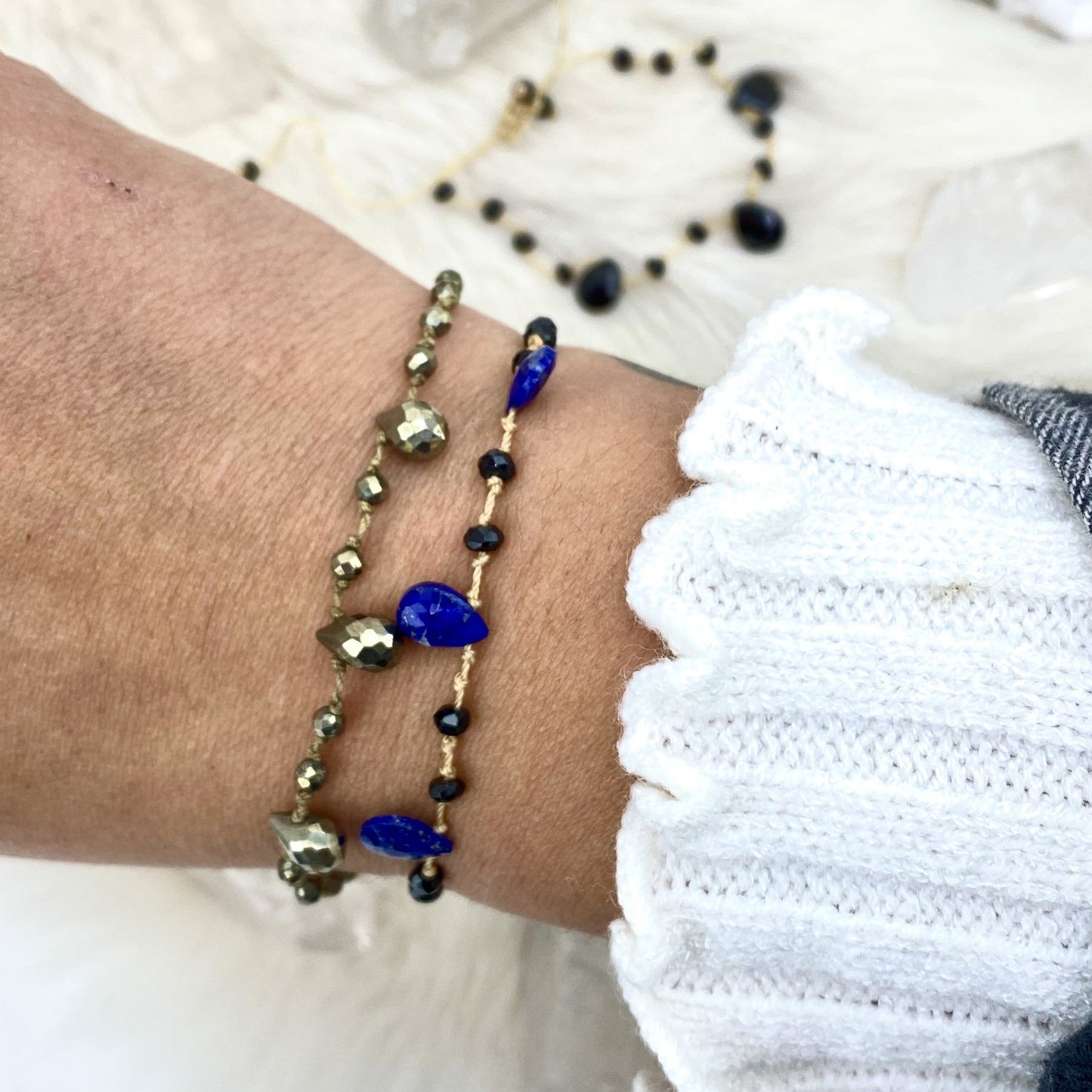 stone beaded bracelet on a wrist