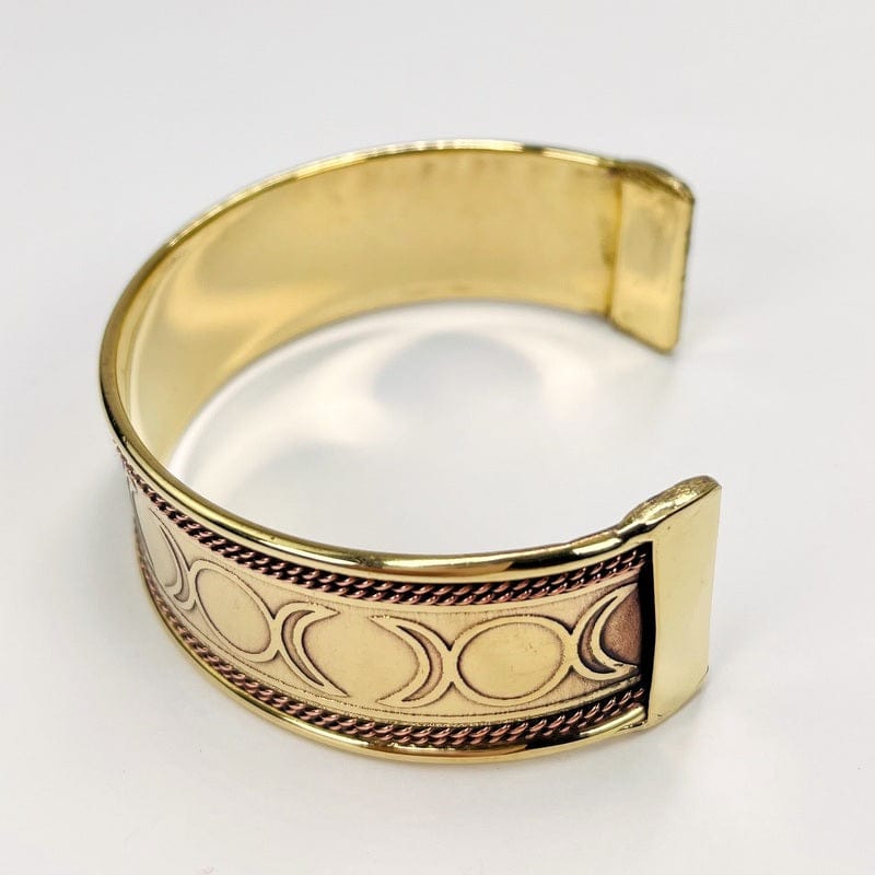 side view of the cuff showing that the moon phases go all around the bracelet 