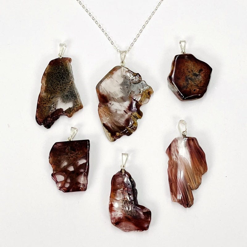amphibole polished slice pendant displayed on chain 