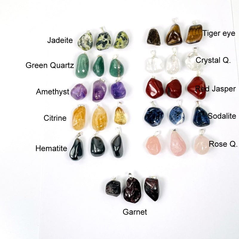 tumbled stone pendants with silver bails next to their stone names 