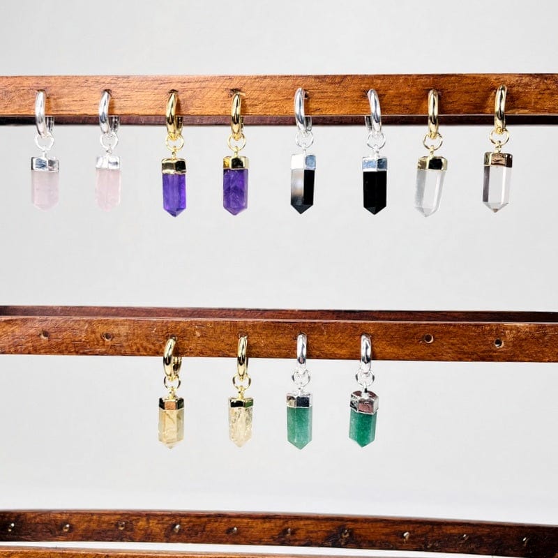 polished point earrings displayed to show how they hang 