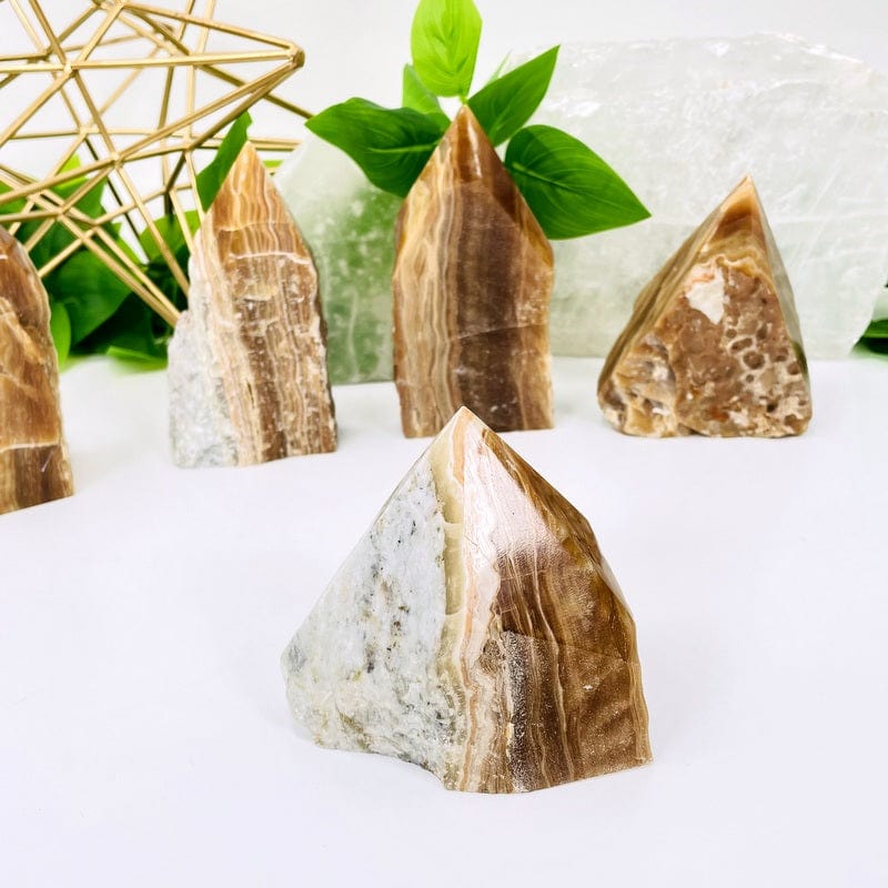 close up of high grade aragonite semi polished point showing stone details 