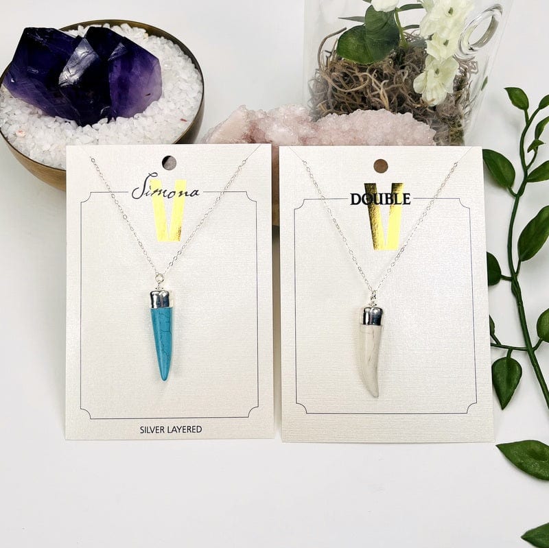 howlite horn necklace available in white or turquoise 